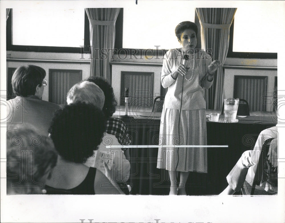 1988 Weight Watchers Meeting Leader Speaks - Historic Images