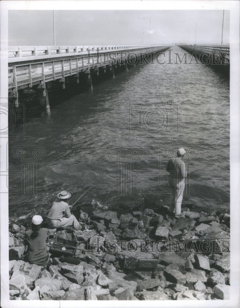 Men fish no fishing signs Gandy Bridge - Historic Images