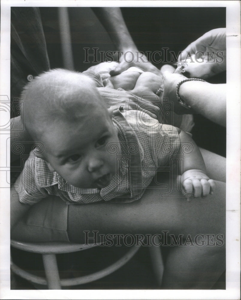  Baby Leon Receives A Round Of Shots From Th - Historic Images