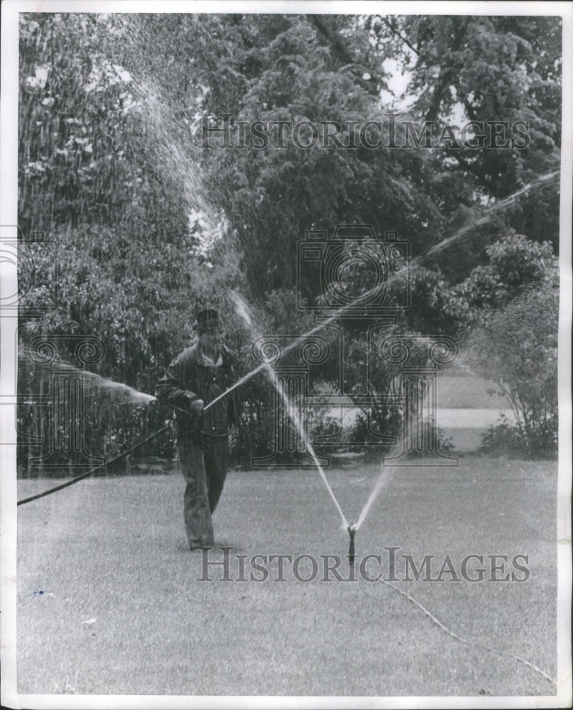 1965 Eugene Padilla Watches Denver Grass - Historic Images