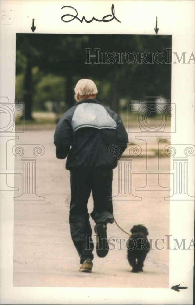 1986 Press Photo Dangers Jogging Detroit Streets Michig- RSA18107 - Historic Images