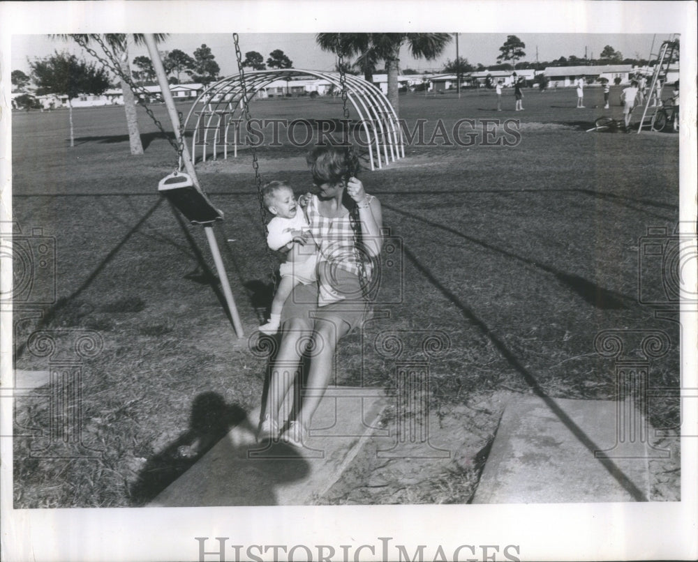 1964 Mothers relaxing, kids at play, at Nor - Historic Images