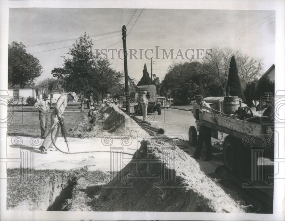 1958 Belcher Road County lines belt pipe-Historic Images