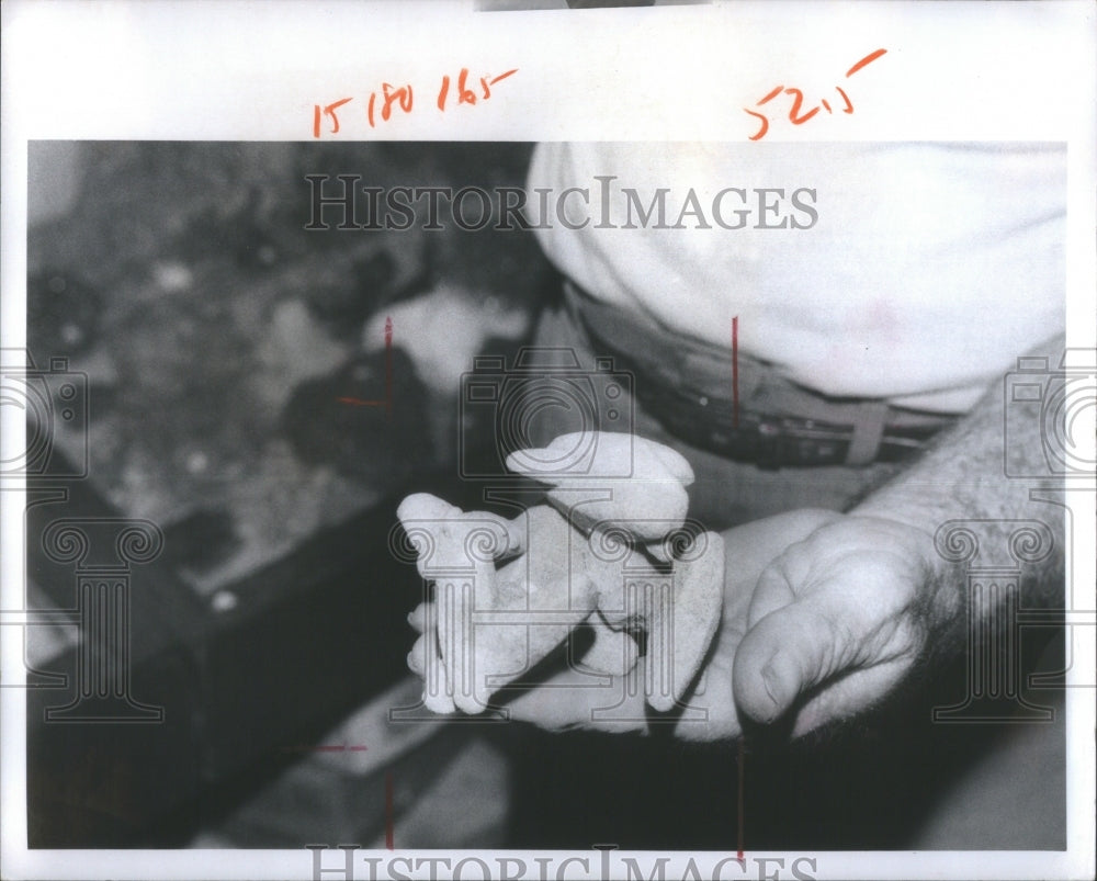 1973 Rocks Hand Man Hold White Shirt-Historic Images