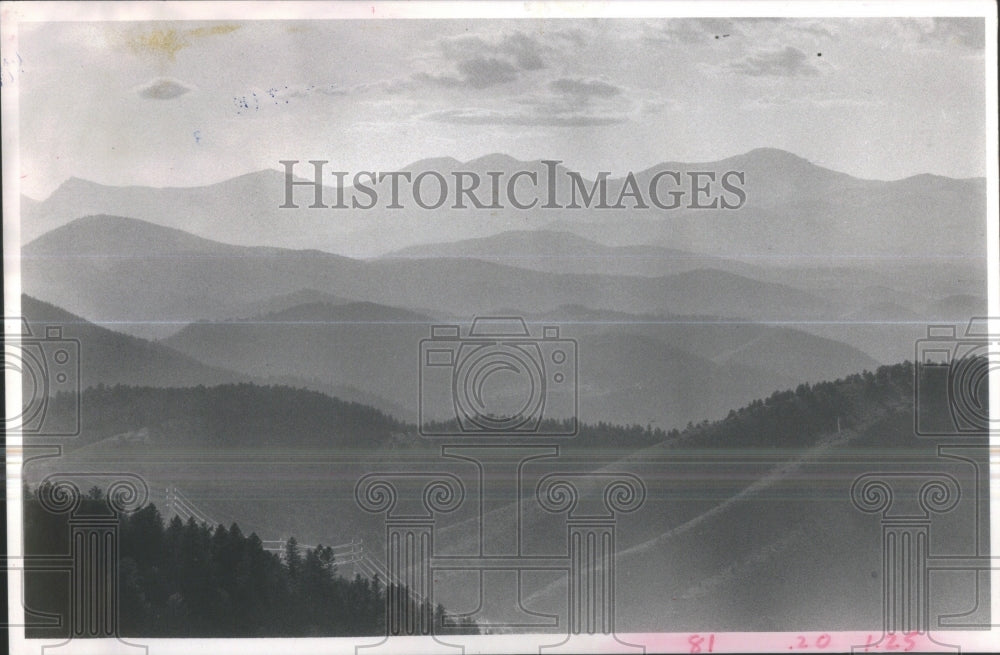 1983 Press Photo Rocky Mountains Clouds Haze Continenta- RSA33339 - Historic Images