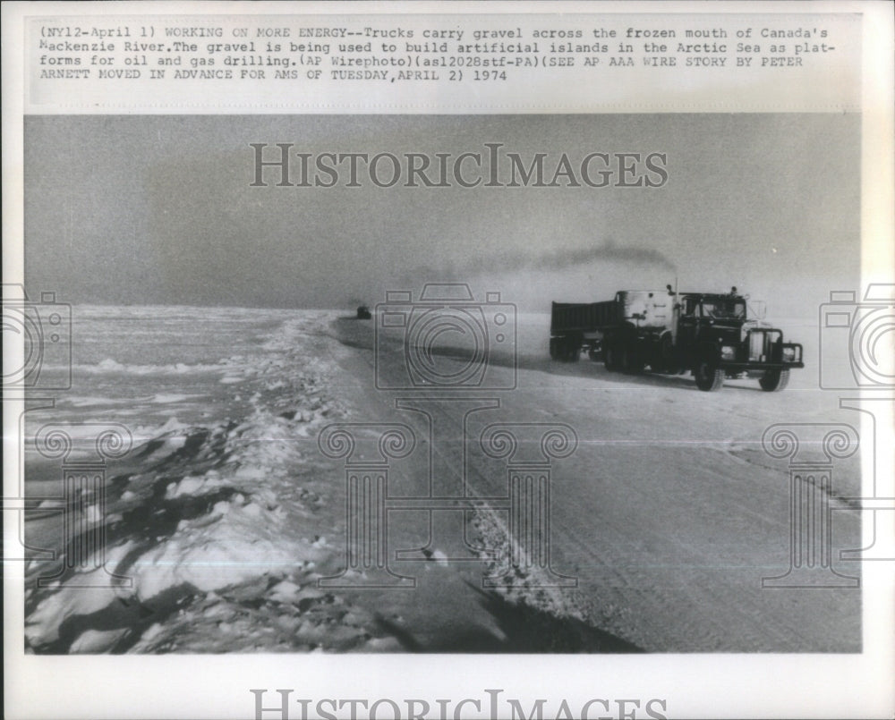 1974 Press Photo Trucks Carry Gravel Across Canada's Fr- RSA35421 - Historic Images
