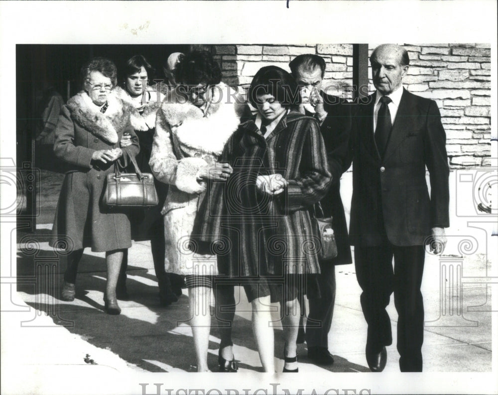 1978 Mrs. Mark Furman escorted from church - Historic Images