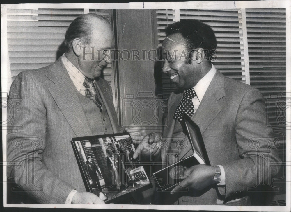 1976, Police Supt.James Rochford with Photo.- RSA50383 - Historic Images