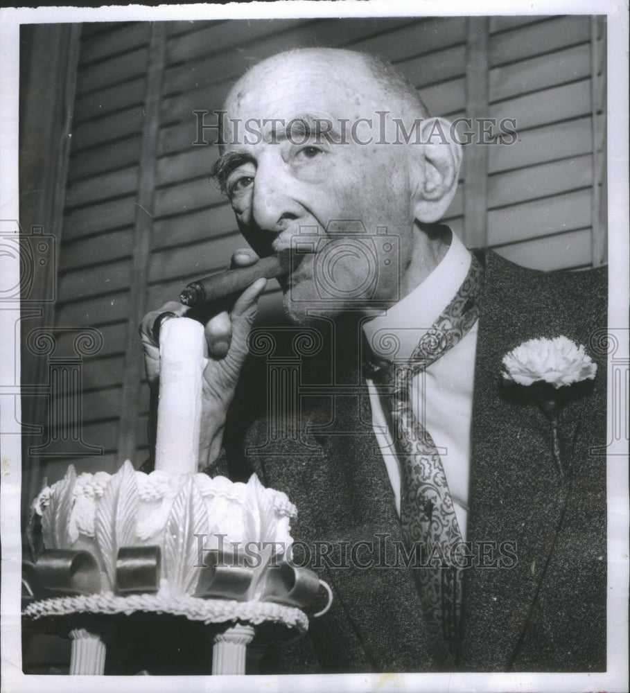 1954 Dr. Maurice Lewi celebrating his 97th birthday with a cigar - Historic Images