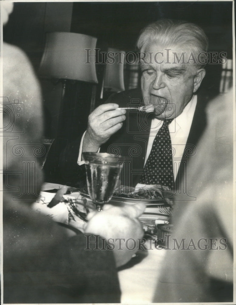 1969 Press Photo Labor leader John L. Lewis Opens Wide for Pineapple- RSA67477 - Historic Images