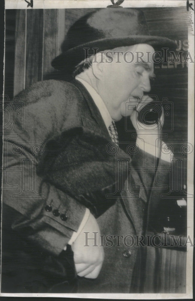 1950 John Lewis CIO leader on telephone at hotel lobby. - Historic Images