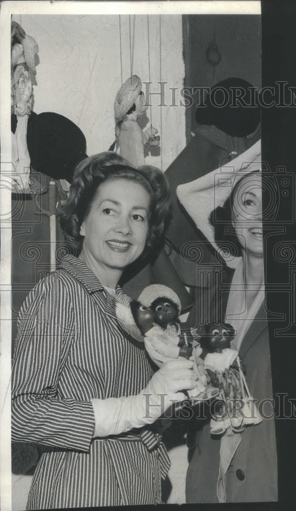 1964 Mrs. Bennett Archambault  Is Banded For A Windy Day - Historic Images