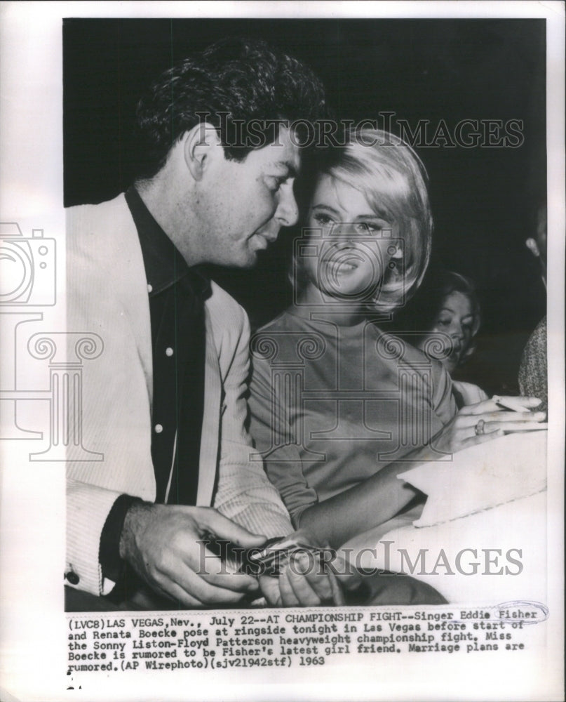 1963 Singer Eddie Fisher and Renata Boecke at ringside - Historic Images