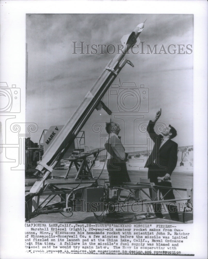 Marshell Kriesel discusses home made rocket with John Hatcher-Historic Images