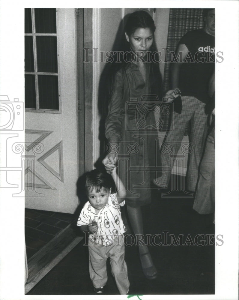 1979 Linda Freeman Charles police station with one children - Historic Images