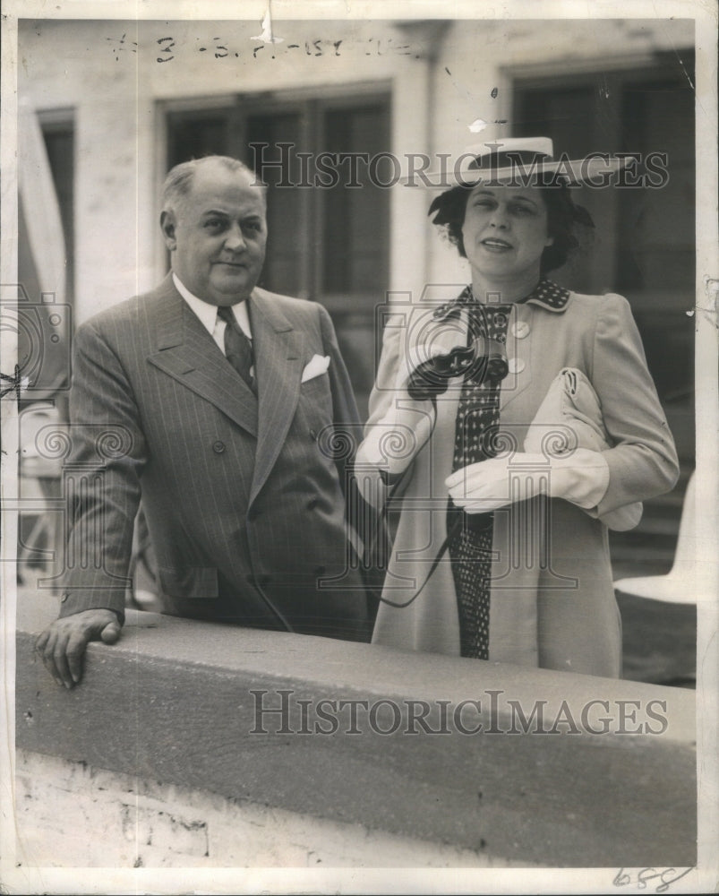 1940 John D. Allen and his wife enjoy the opening day festivities - Historic Images