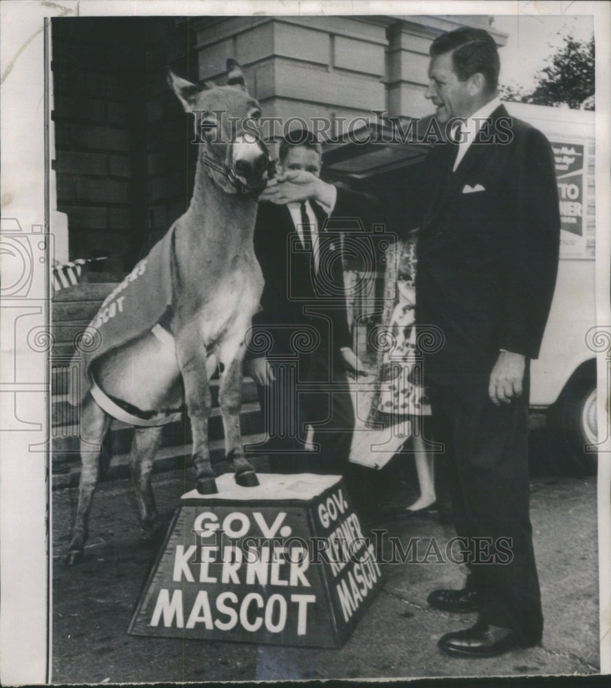 1964 Illinois Gov. Otto Kerner examines &quot;Bonus Baby&quot; a Sicilian donk - Historic Images