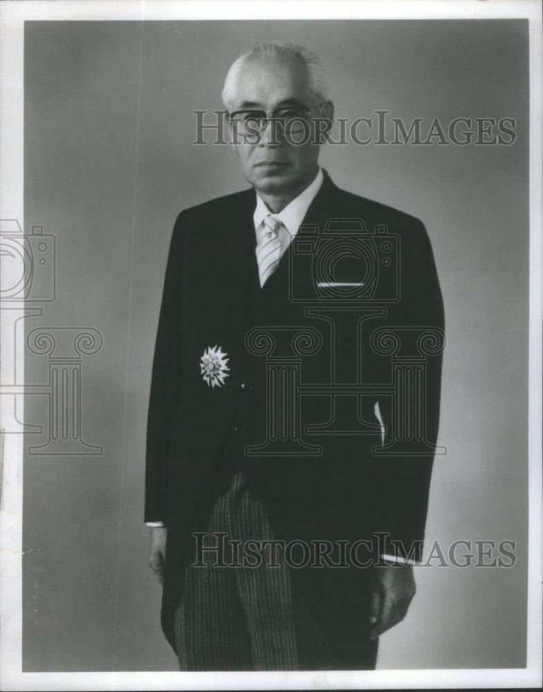 1980, Kusuo Hirata Pose Black Suit- RSA90327 - Historic Images