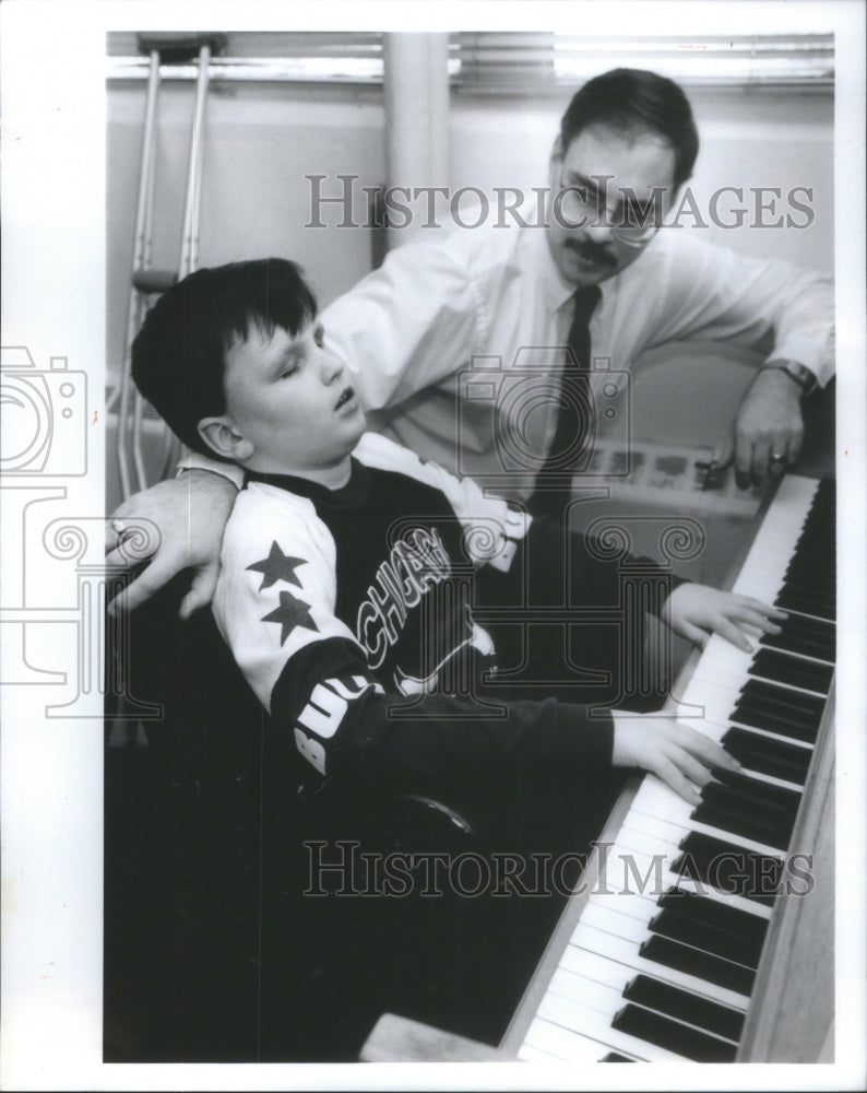 1991 Nalco Chemical&#39;s Bill Horoszko helps son Timothy at Lighthouse - Historic Images