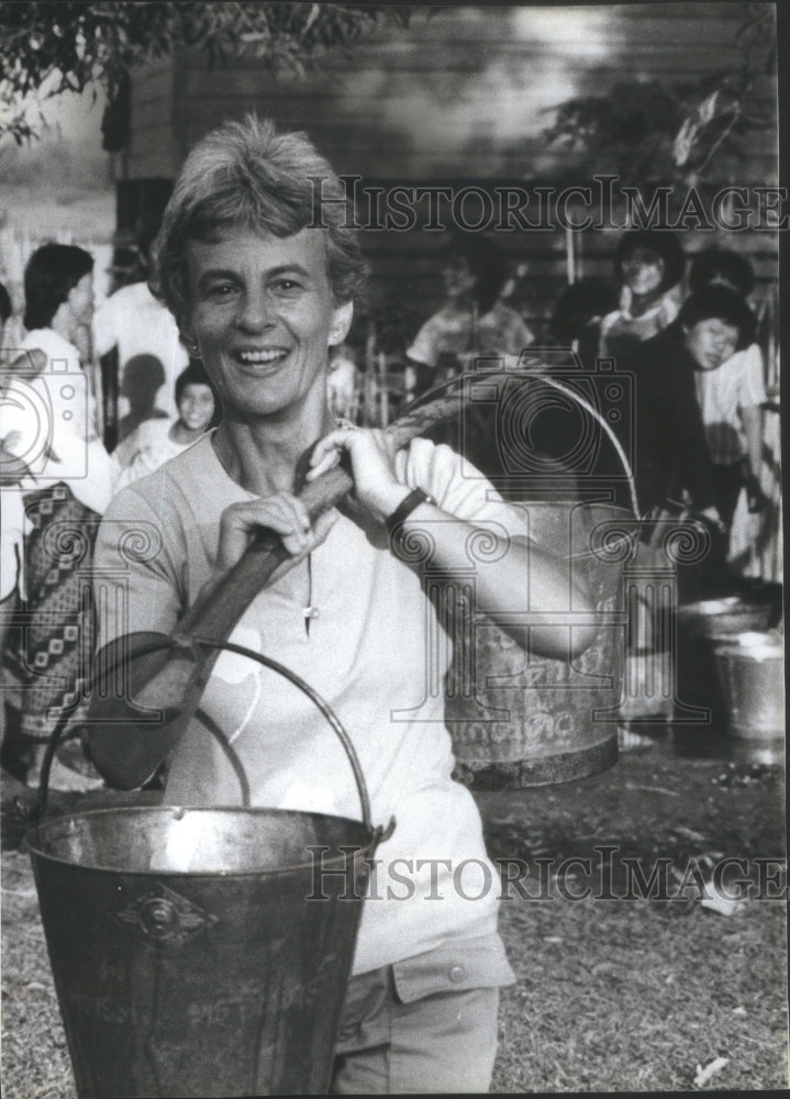 1984 Marion Geaf-Volunteer Khun Nan Carry Buckets Water Stilt House - Historic Images