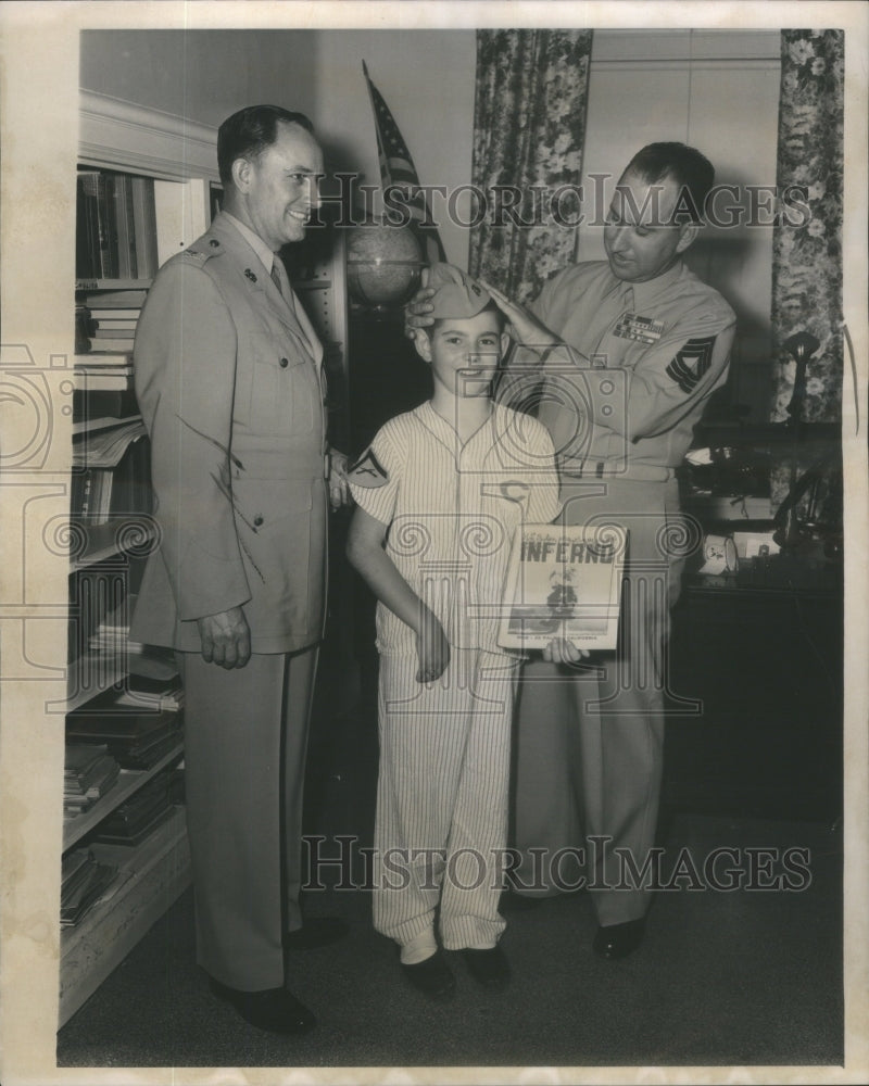 1961 Sargent Eugene Wilkinson Adjusts the Cap of Michael Lukecart - Historic Images