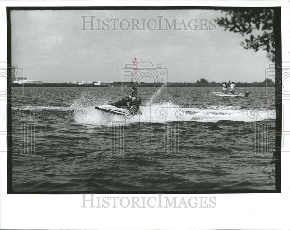 1991 Press Photo Bill Adair water Scooter water Boat Men - Historic Images