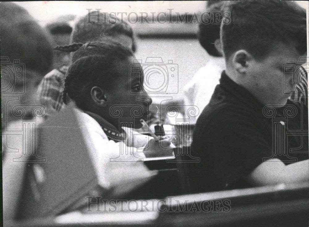 1968 Press Photo Little girl watches her new teacher in class. - Historic Images