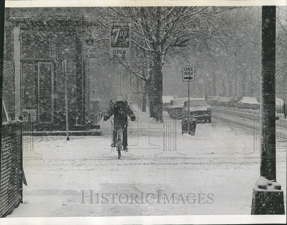 1971 Press Photo Snow storms Chicago South side youngster ride bikes mock autos - Historic Images