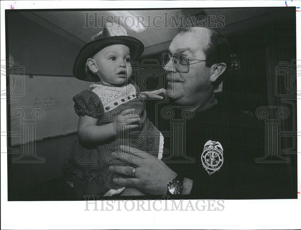 1991 Press Photo Dan Turilli Holds Stephanie Echer on Her Birthday in Departmen - Historic Images