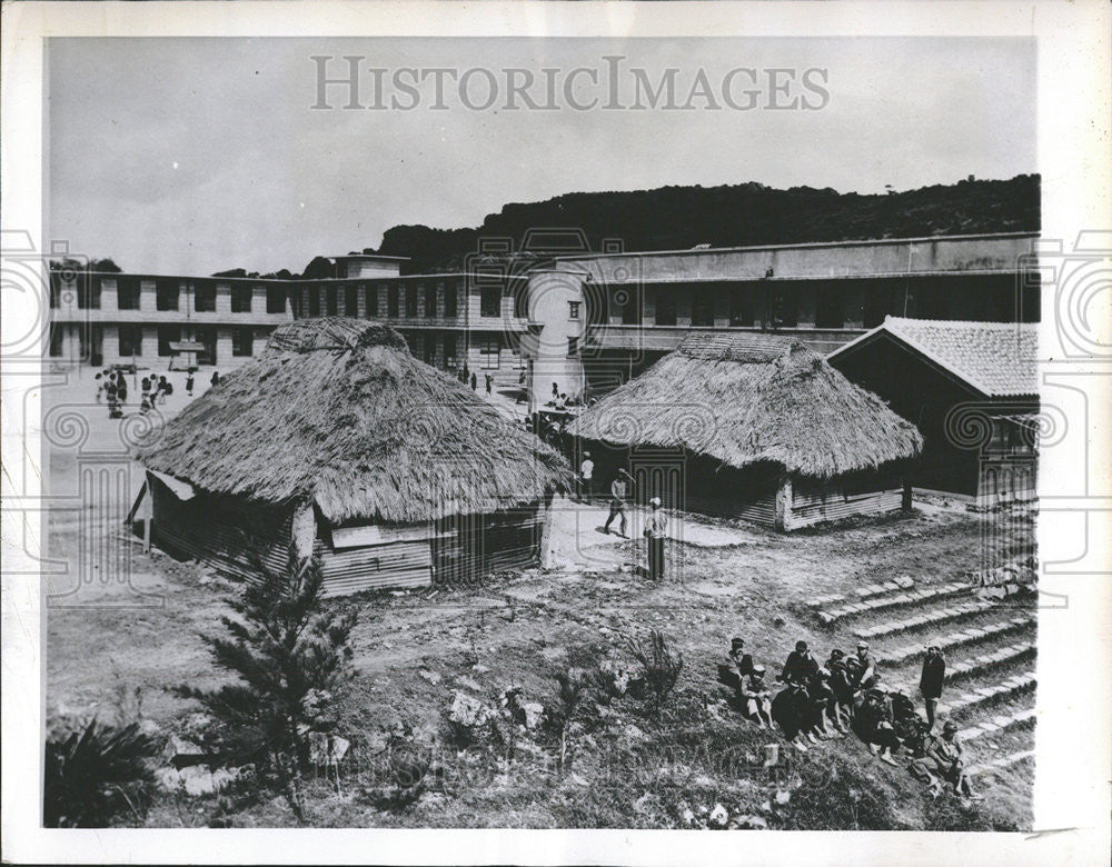 1954 Press Photo Modern school building grass roofs Okinawa Island States - Historic Images