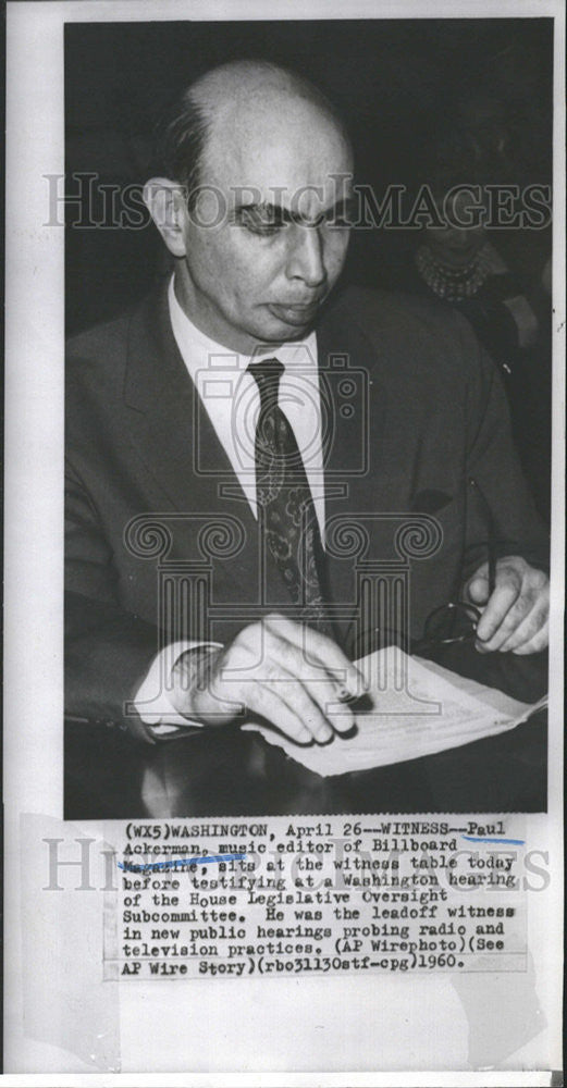 1960 Press Photo Paul Ackerman Music Editor Billboard Magazine Sit Witness Table - Historic Images