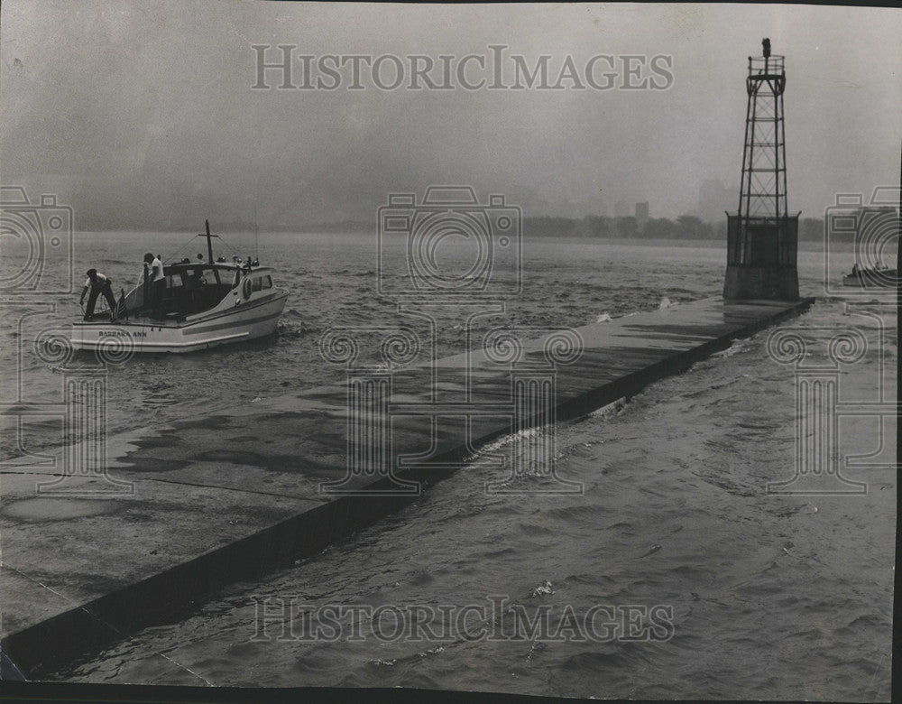 1954 Press Photo Seven Fishermen Montrose Harbor Seiche Giant Swept Water - Historic Images