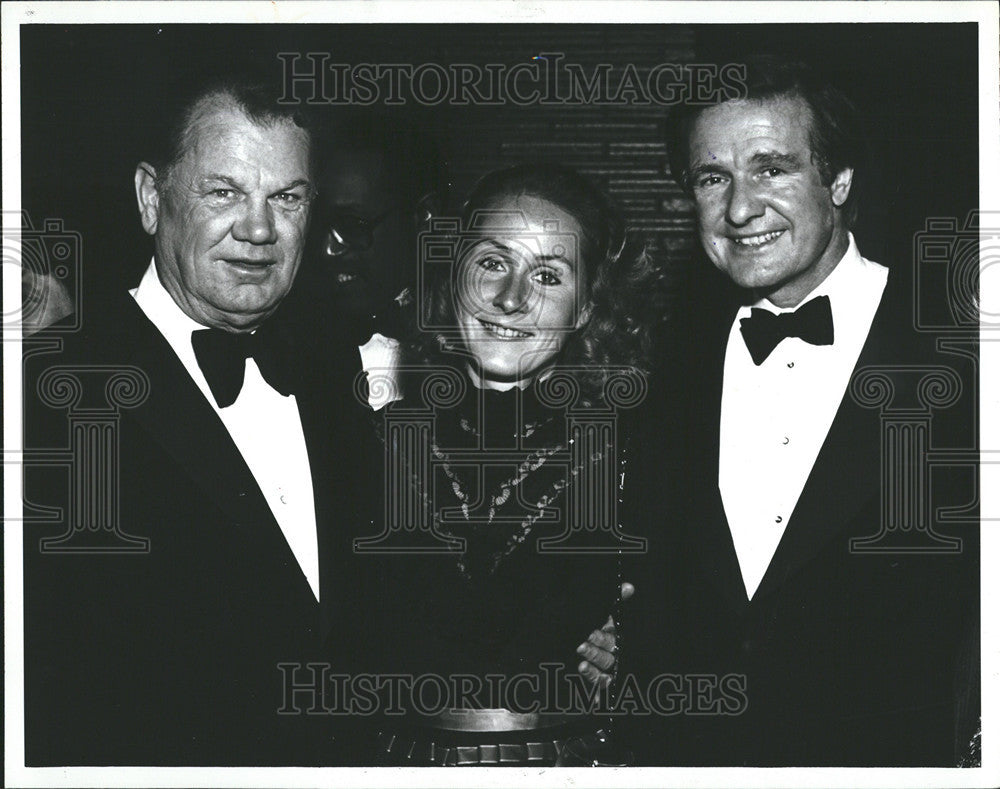 1984 Press Photo Hoot McInerney and Donald Riegle and wife Lori. - Historic Images