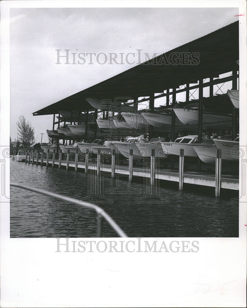 1963 Press Photo Siesta Key Marina Sarasota customer inside storage - Historic Images