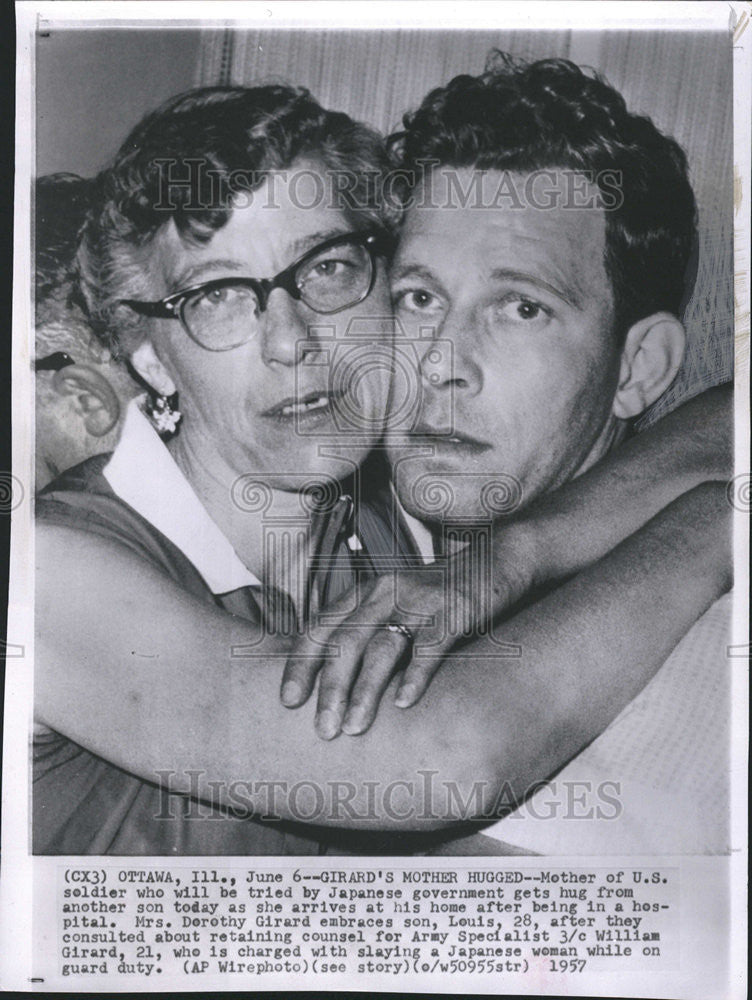 1957 Press Photo Mrs. Dorothy Girard Embraces Son, Louis Girard, after Trial - Historic Images