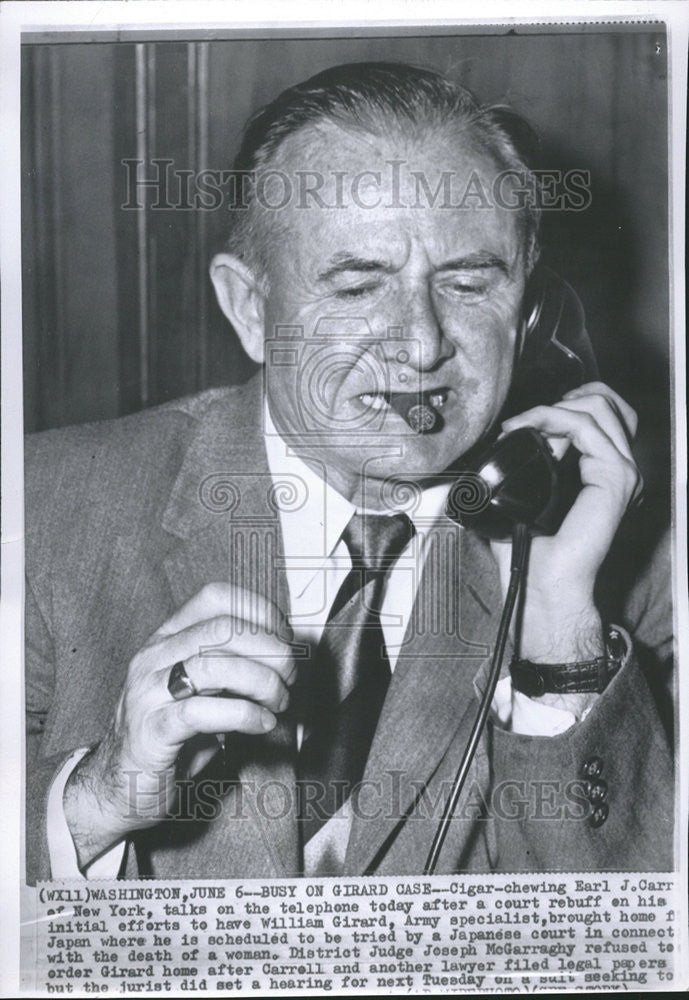 1957 Press Photo Cigar chewing Earl Carr New York William Girard telephone Case - Historic Images