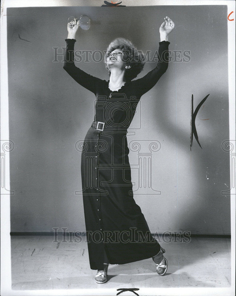 1975 Press Photo Woman Celebrating Modeling Evening Wear Dress - Historic Images