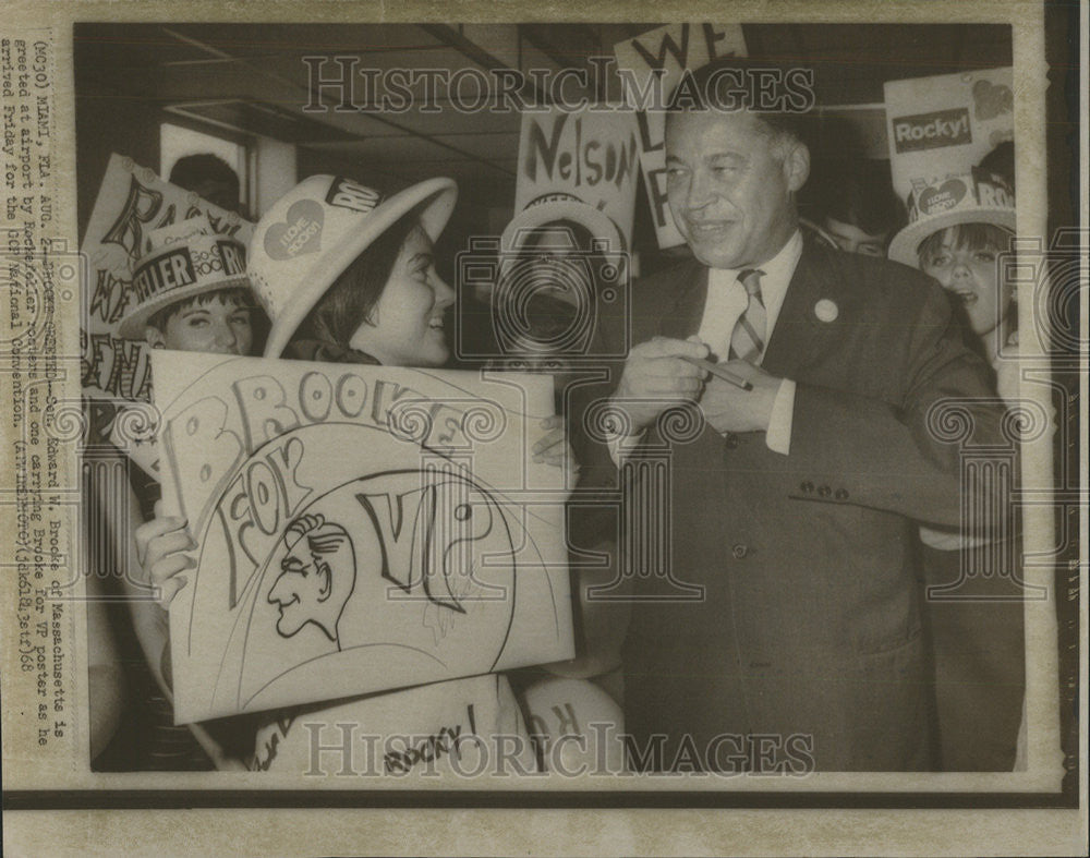 1968 Press Photo Sen Edward Brooke Massachusetts Rockefeller VP Poster Airport - Historic Images