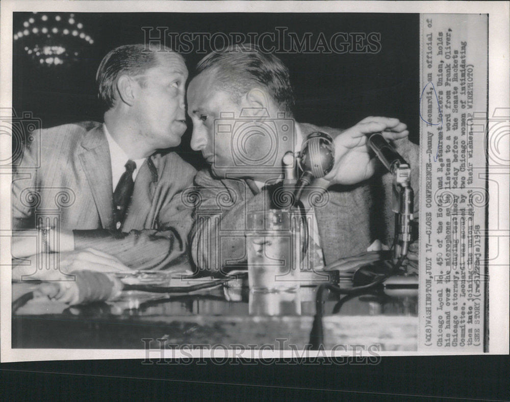 1958 Press Photo Danny Leonardi Listens to Frank Oliver During Testimony - Historic Images