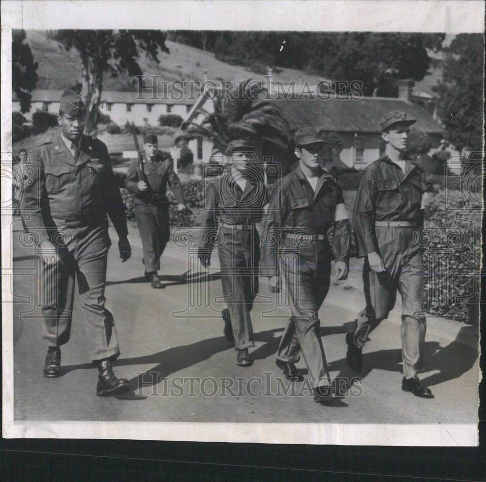 1955 Press Photo Turncoats March Prisoner Stockade - Historic Images