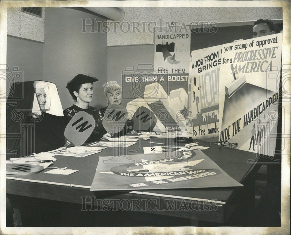 1957 Press Photo 13th Annual Hign School Poster and Illustration Contest Judged - Historic Images