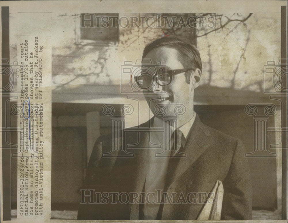 1966 Press Photo Capt. Howard Levy poses outside his home. - Historic Images