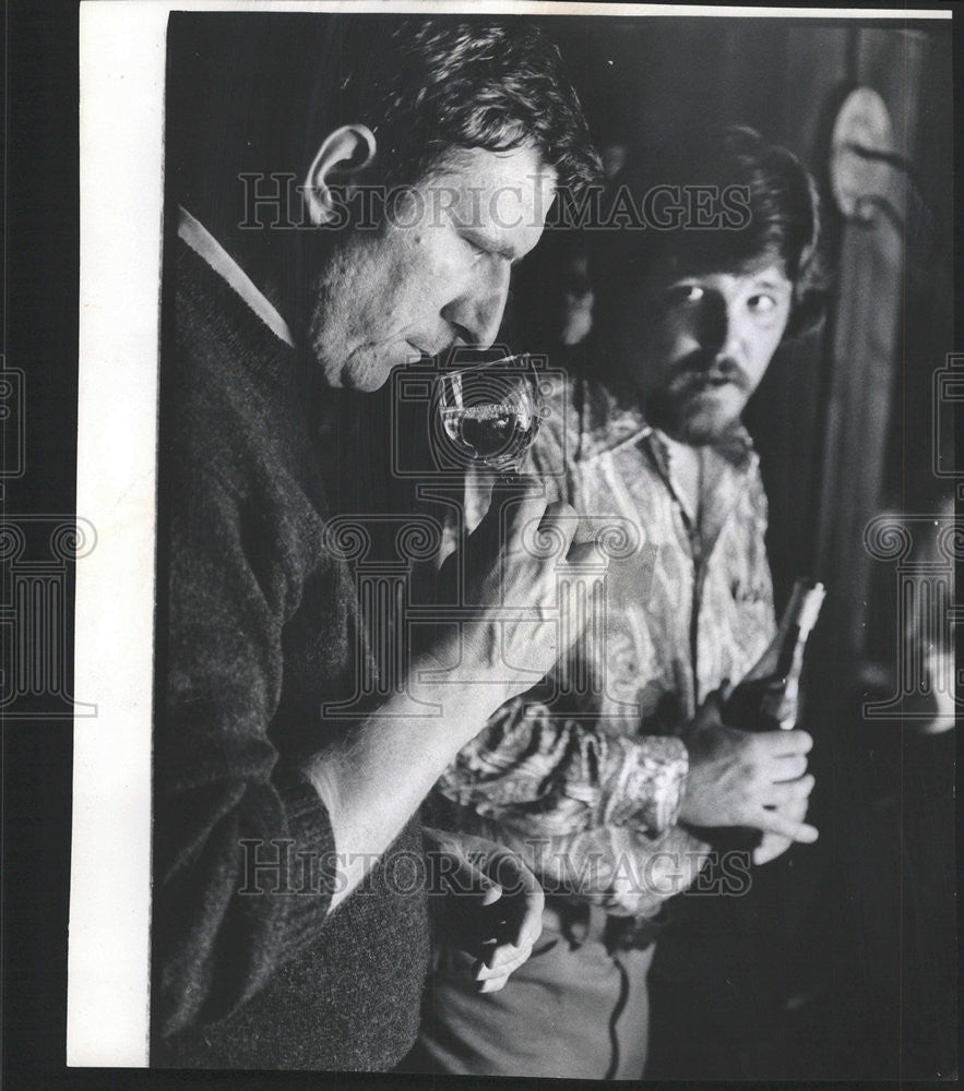 1972 Press Photo Reporter  Robert Billings samples one of Michigan Wines. - Historic Images