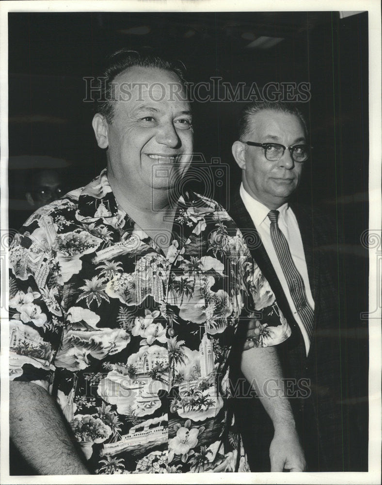 1964 Press Photo Woodrow Leffler seized by police for allegedly attempting fire - Historic Images