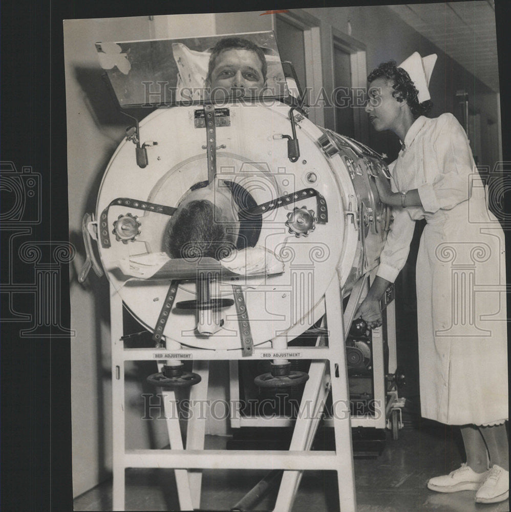 1957 Press Photo REPORTER EDWARD BAUMANN NURSE BARBARA RHYMES - Historic Images