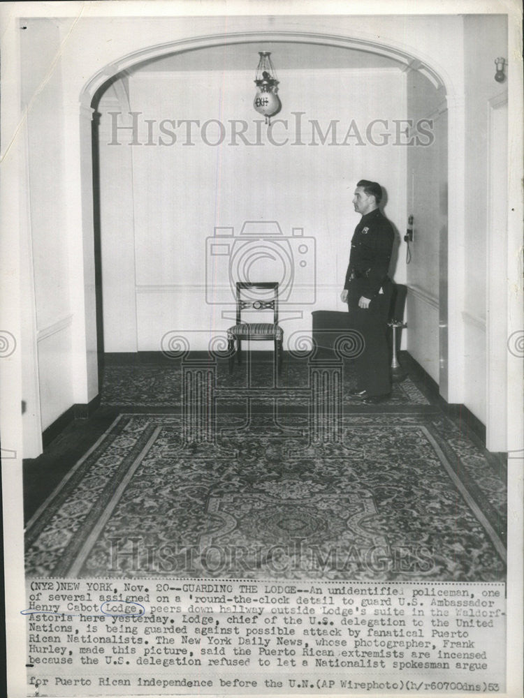 1953 Press Photo Policeman Guards US Ambassador Henry Cabot Lodge - Historic Images