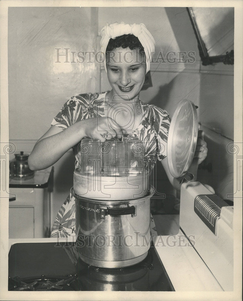 1947 Press Photo Evelyn Kotalik Bottles - Historic Images