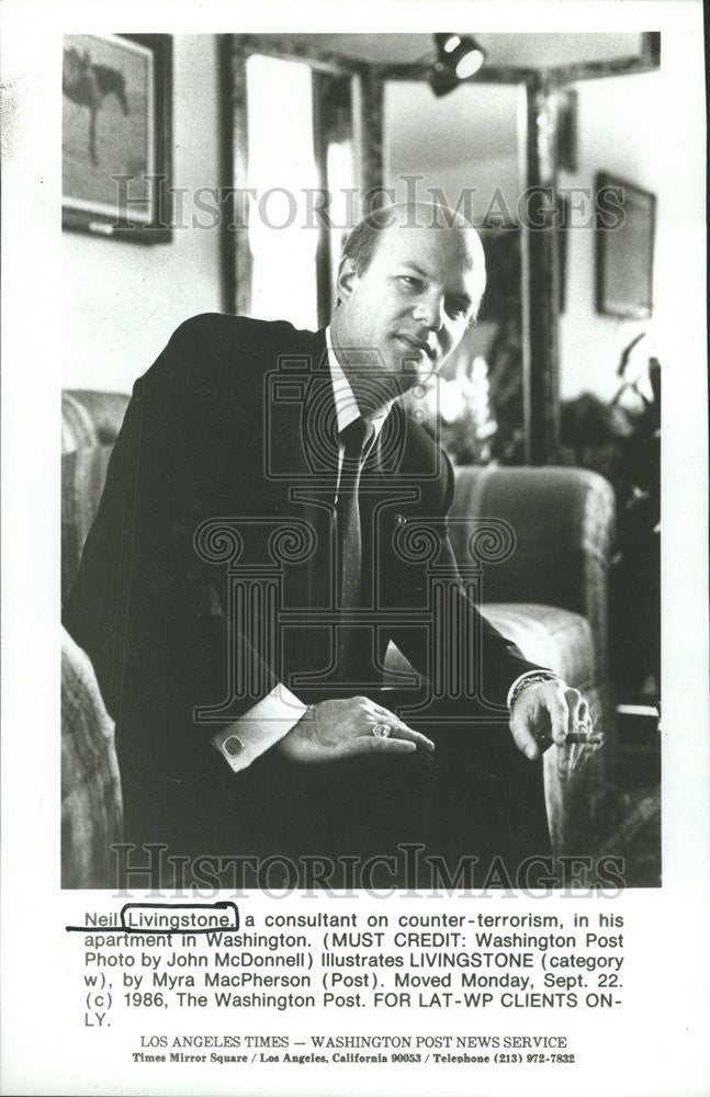 1986 Press Photo Neil Livingston Consultant Post News Service - Historic Images