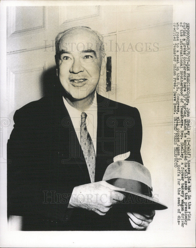 1957 Press Photo John Shelley hat ring press conference Brotherhood Us congress - Historic Images