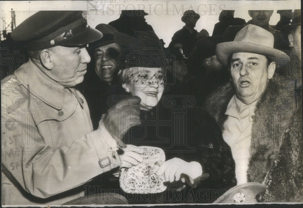 1942 George Marshall, Mrs. Marshall and Leon Henderson at Game-Historic Images